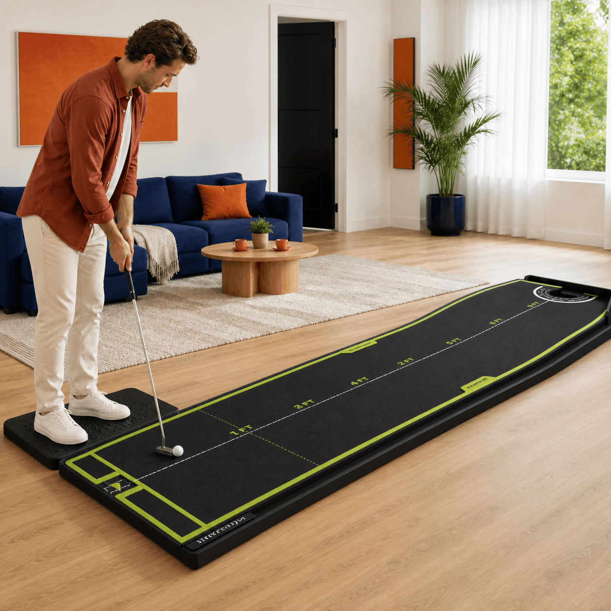 A home golfer setting up a new variable-terrain putting challenge.